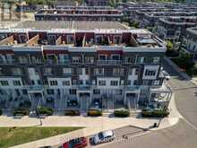 6 - 145 LONG BRANCH AVENUE | Toronto Ontario | Slide Image Two