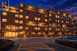 323 - 4064 LAWRENCE AVENUE E | Toronto Ontario | Slide Image One