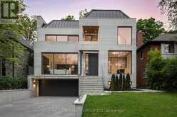 64 GLENGOWAN ROAD | Toronto Ontario | Slide Image One
