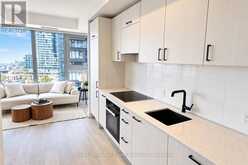 1004 - 1 QUARRINGTON LANE | Toronto Ontario | Slide Image Two