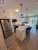 313 - 50 KAITTING TRAIL | Oakville Ontario | Slide Image Three