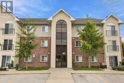 110 - 87 ASPEN SPRINGS DRIVE | Clarington Ontario | Slide Image One