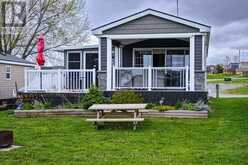3 CHERRY BEACH LANE - 486 COUNTY ROAD 18 | Prince Edward Ontario | Slide Image One
