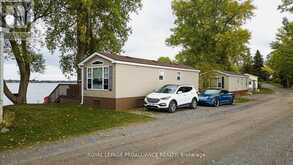 486 CTY RD 18- 64 CHERRY BEACH LANE | Prince Edward Ontario | Slide Image One