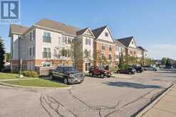 301 - 106 ASPEN SPRINGS DRIVE | Clarington Ontario | Slide Image One