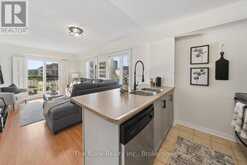 301 - 106 ASPEN SPRINGS DRIVE | Clarington Ontario | Slide Image Two