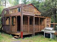58 ROBINSON LAKE ROAD | Tudor and Cashel Ontario | Slide Image One