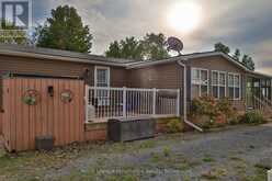 486 CTY RD 18- 50 CHERRY BEACH LANE | Prince Edward Ontario | Slide Image One