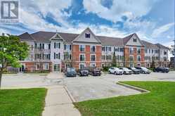 210 - 106 ASPEN SPRINGS DRIVE | Clarington Ontario | Slide Image One