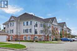 210 - 106 ASPEN SPRINGS DRIVE | Clarington Ontario | Slide Image Two