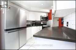 105 - 360 WATSON STREET W | Whitby Ontario | Slide Image Thirteen