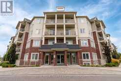 420 - 84 ASPEN SPRINGS DRIVE | Clarington Ontario | Slide Image One
