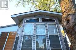 486 COUNTY ROAD 18 - 8 FOREST GROVE LANE | Prince Edward Ontario | Slide Image Three