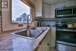 30 NOTRE DAME | Timmins Ontario | Slide Image Ten