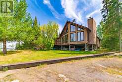 27 LILY PAD BAY | Keewatin Ontario | Slide Image Two